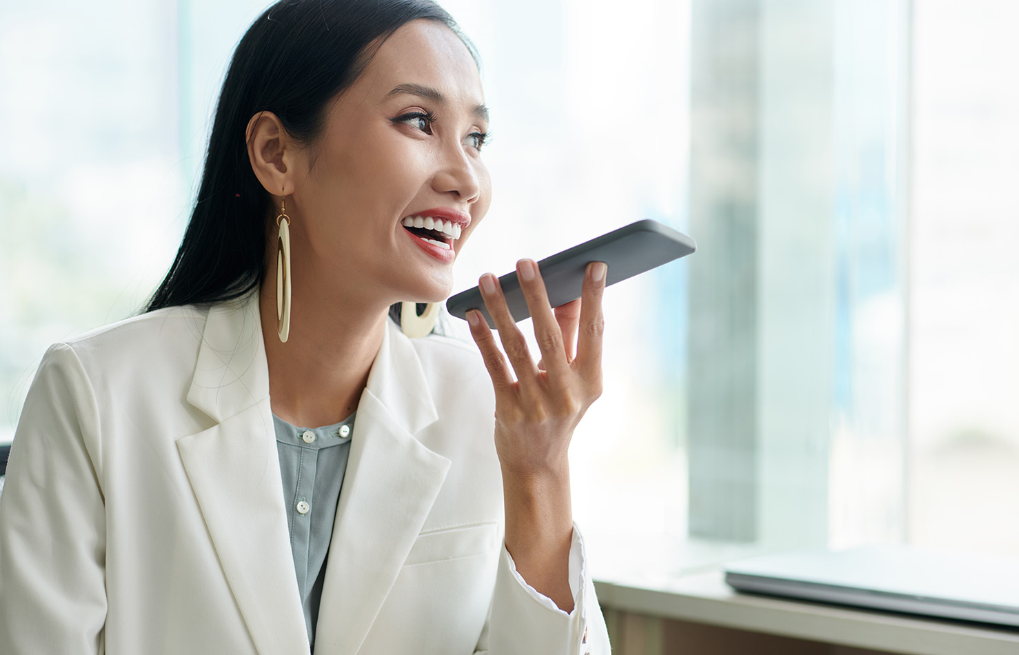 Business women using voice recognition